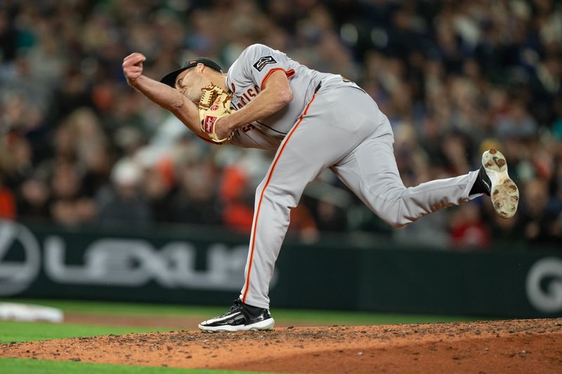 Aug 23, 2024; Seattle, Washington, USA; San Francisco Giants reliever Tyler Rogers (71) delivers a pitch during the eighth inning against the Seattle Mariners at T-Mobile Park. Mandatory Credit: Stephen Brashear-USA TODAY Sports