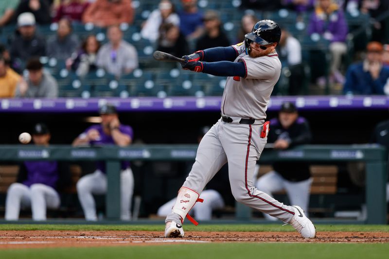 Apr 28, 2025; Denver, Colorado, USA; Atlanta Braves left fielder Alex Verdugo (8) hits an RBI single in the third inning against the Colorado Rockies at Coors Field. Mandatory Credit: Isaiah J. Downing-Imagn Images