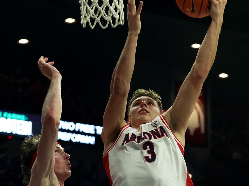 Jan 6, 2024; Tucson, Arizona, USA; Arizona Wildcats guard Pelle Larsson (3) makes a basket against Utah Utes center Branden Carlson (35) during the second half at McKale Center. Mandatory Credit: Zachary BonDurant-USA TODAY Sports