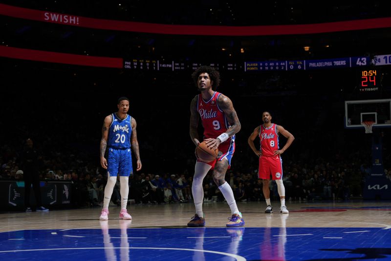 PHILADELPHIA, PA - APRIL 12: Kelly Oubre Jr. #9 of the Philadelphia 76ers shoots a free throw during the game against the Orlando Magic on April 12, 2024 at the Wells Fargo Center in Philadelphia, Pennsylvania NOTE TO USER: User expressly acknowledges and agrees that, by downloading and/or using this Photograph, user is consenting to the terms and conditions of the Getty Images License Agreement. Mandatory Copyright Notice: Copyright 2024 NBAE (Photo by Jesse D. Garrabrant/NBAE via Getty Images)