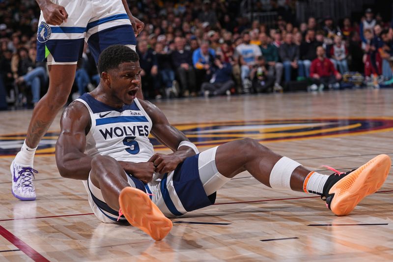 DENVER, CO - APRIL 10: Anthony Edwards #5 of the Minnesota Timberwolves celebrates during the game against the Denver Nuggets on April 10, 2024 at the Ball Arena in Denver, Colorado. NOTE TO USER: User expressly acknowledges and agrees that, by downloading and/or using this Photograph, user is consenting to the terms and conditions of the Getty Images License Agreement. Mandatory Copyright Notice: Copyright 2024 NBAE (Photo by Bart Young/NBAE via Getty Images)