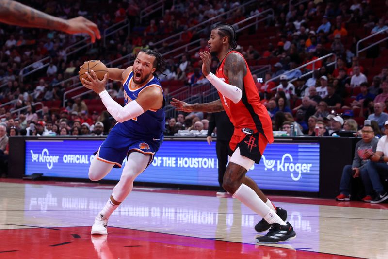 HOUSTON, TX - NOVEMBER 4: Jalen Brunson #11 of the New York Knicks drives to the basket during the game against the Houston Rockets on November 4, 2024 at the Toyota Center in Houston, Texas. NOTE TO USER: User expressly acknowledges and agrees that, by downloading and or using this photograph, User is consenting to the terms and conditions of the Getty Images License Agreement. Mandatory Copyright Notice: Copyright 2024 NBAE (Photo by Michael Starghill Jr./NBAE via Getty Images)