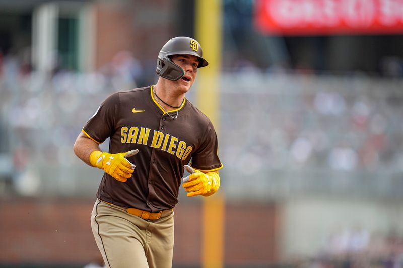 May 25, 2025; Cumberland, Georgia, USA; San Diego Padres left fielder Gavin Sheets (30) reacts after hitting a home run against the Atlanta Braves during the sixth inning at Truist Park. Mandatory Credit: Dale Zanine-Imagn Images