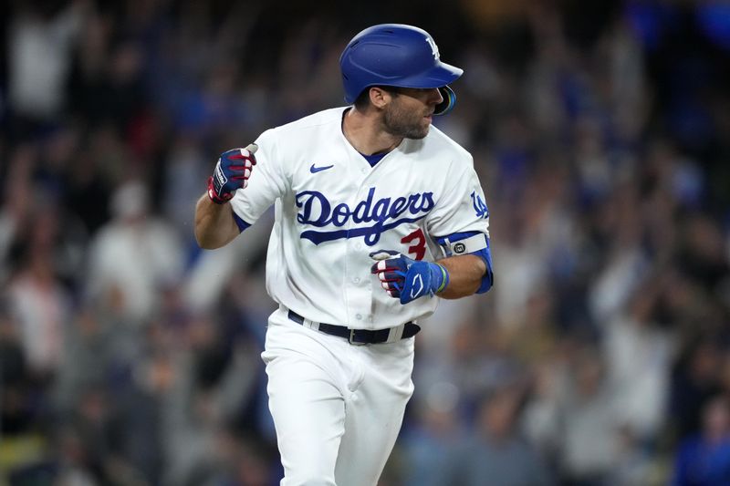 Jun 15, 2023; Los Angeles, California, USA; Los Angeles Dodgers third baseman Chris Taylor (3) rounds the bases on a grand slam home run in the sixth inning against the Chicago White Sox at Dodger Stadium. Mandatory Credit: Kirby Lee-USA TODAY Sports