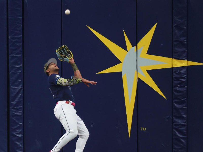 May 20, 2023; St. Petersburg, Florida, USA; Tampa Bay Rays center fielder Jose Siri (22) catches a fly ball during the first inning against the Milwaukee Brewers at Tropicana Field. Mandatory Credit: Kim Klement-USA TODAY Sports