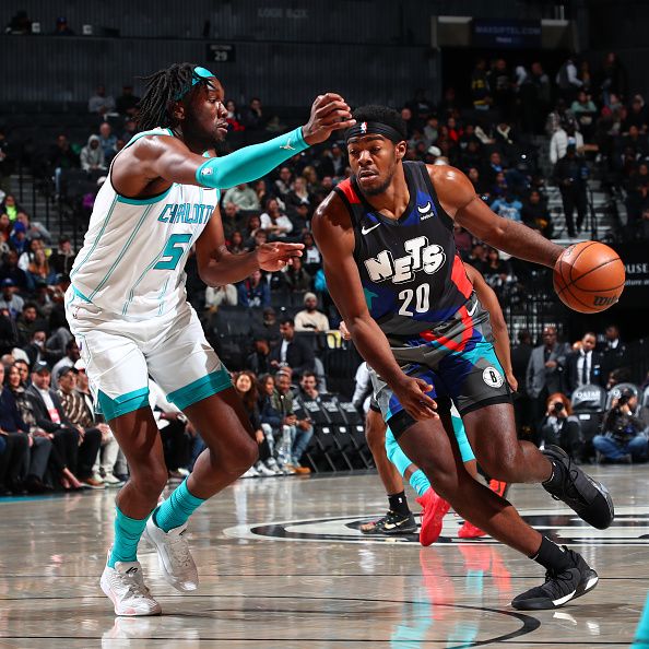 BROOKLYN, NY - NOVEMBER 30: Day'Ron Sharpe #20 of the Brooklyn Nets dribbles the ball during the game against the Charlotte Hornets on November 30, 2023 at Barclays Center in Brooklyn, New York. NOTE TO USER: User expressly acknowledges and agrees that, by downloading and or using this Photograph, user is consenting to the terms and conditions of the Getty Images License Agreement. Mandatory Copyright Notice: Copyright 2023 NBAE (Photo by David L. Nemec/NBAE via Getty Images)