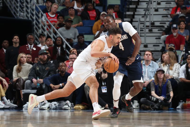 NEW ORLEANS, LA - NOVEMBER 6: Georges Niang #20 of the Cleveland Cavaliers drives to the basket during the game against the New Orleans Pelicans on November 6, 2024 at the Smoothie King Center in New Orleans, Louisiana. NOTE TO USER: User expressly acknowledges and agrees that, by downloading and or using this Photograph, user is consenting to the terms and conditions of the Getty Images License Agreement. Mandatory Copyright Notice: Copyright 2024 NBAE (Photo by Layne Murdoch Jr./NBAE via Getty Images)