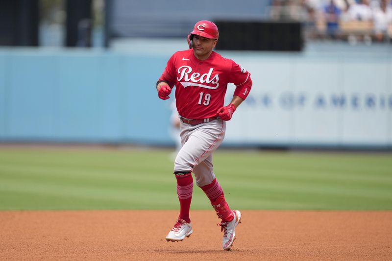 Jul 30, 2023; Los Angeles, California, USA; Cincinnati Reds designated hitter Joey Votto (19) rounds the bases after hitting a home run in the third inning against the Los Angeles Dodgers at Dodger Stadium. Mandatory Credit: Kirby Lee-USA TODAY Sports