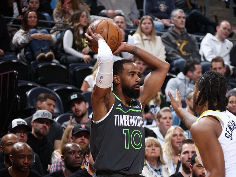 SALT LAKE CITY, UT - MARCH 16: Mike Conley #10 of the Minnesota Timberwolves looks to pass the ball during the game against the Utah Jazz on March 16, 2024 at Delta Center in Salt Lake City, Utah. NOTE TO USER: User expressly acknowledges and agrees that, by downloading and or using this Photograph, User is consenting to the terms and conditions of the Getty Images License Agreement. Mandatory Copyright Notice: Copyright 2024 NBAE (Photo by Melissa Majchrzak/NBAE via Getty Images)