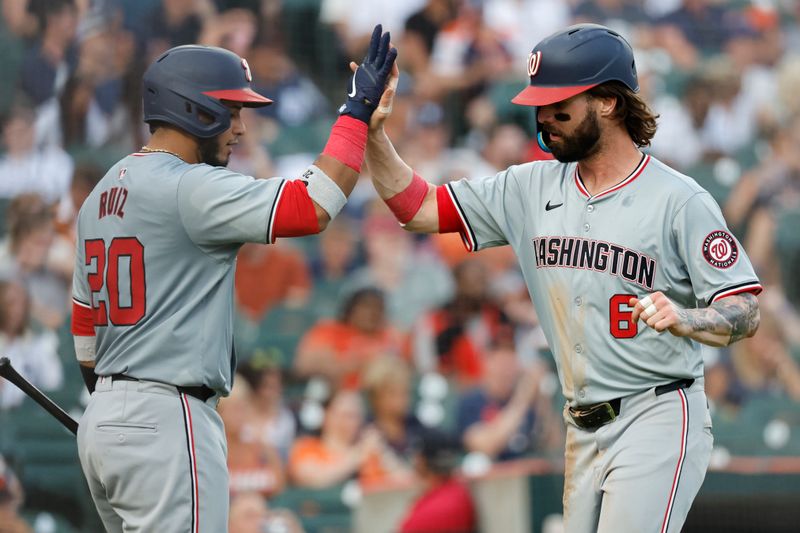 Jun 12, 2024; Detroit, Michigan, USA;  Washington Nationals left fielder Jesse Winker (6) receives congratulations from catcher Keibert Ruiz (20) after scoring in the fifth inning against the Detroit Tigers at Comerica Park. Mandatory Credit: Rick Osentoski-USA TODAY Sports