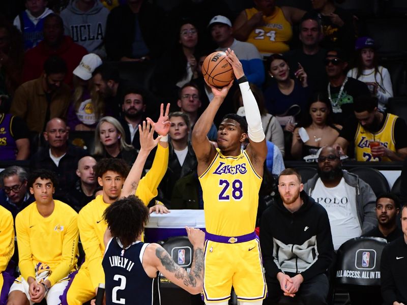 LOS ANGELES, CA - JANUARY 17: Rui Hachimura #28 of the Los Angeles Lakers shoots a three point basket during the game against the Dallas Mavericks on January 17, 2024 at Crypto.Com Arena in Los Angeles, California. NOTE TO USER: User expressly acknowledges and agrees that, by downloading and/or using this Photograph, user is consenting to the terms and conditions of the Getty Images License Agreement. Mandatory Copyright Notice: Copyright 2024 NBAE (Photo by Adam Pantozzi/NBAE via Getty Images)