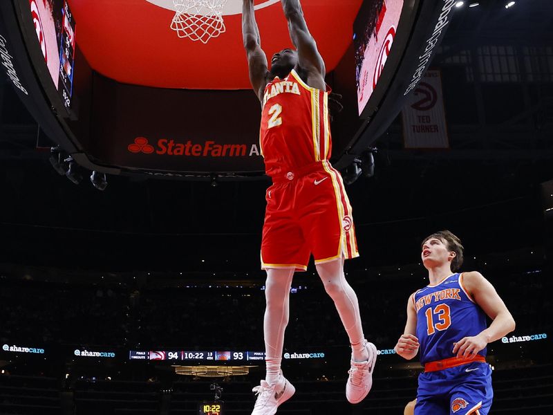 ATLANTA, GEORGIA - NOVEMBER 6: Keaton Wallace #2 of the Atlanta Hawks dunks during the fourth quarter against the New York Knicks at State Farm Arena on November 6, 2024 in Atlanta, Georgia. NOTE TO USER: User expressly acknowledges and agrees that, by downloading and or using this photograph, User is consenting to the terms and conditions of the Getty Images License Agreement. (Photo by Todd Kirkland/Getty Images)