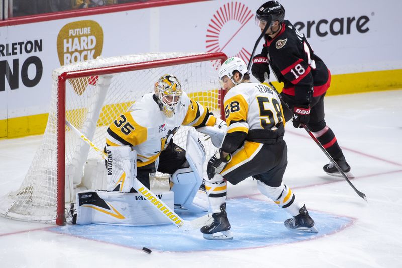 Mar 12, 2024; Ottawa, Ontario, CAN; Pittsburgh Penguins goalie Tristan Jarry (35) makes a save on a shot from Ottawa Senators center Tim Stutzle (18) in the third period at the Canadian Tire Centre. Mandatory Credit: Marc DesRosiers-USA TODAY Sports