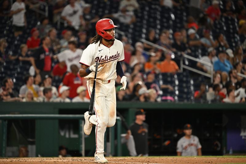 Aug 6, 2024; Washington, District of Columbia, USA; Washington Nationals left fielder James Wood (29) tosses his bat after hitting a 2 run home run against the San Francisco Giants during the eighth inning at Nationals Park. Mandatory Credit: Rafael Suanes-USA TODAY Sports