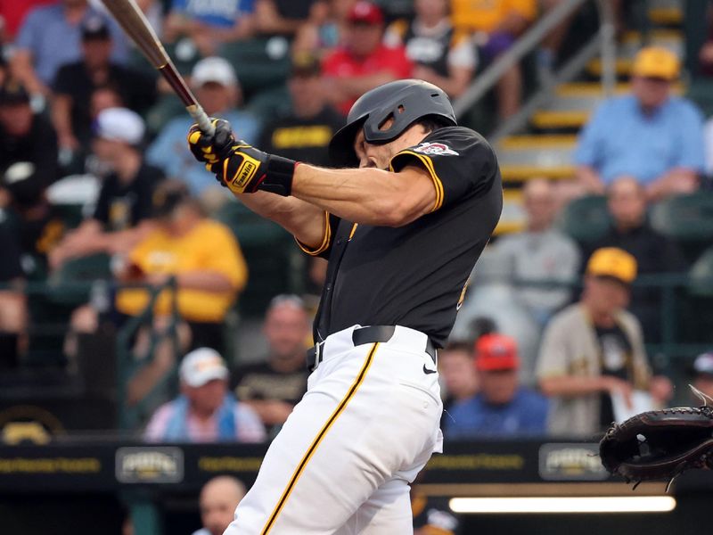 Mar 21, 2024; Bradenton, Florida, USA; Pittsburgh Pirates left fielder Bryan Reynolds (10) hits a home run during the fourth inning against the Toronto Blue Jays at LECOM Park. Mandatory Credit: Kim Klement Neitzel-USA TODAY Sports