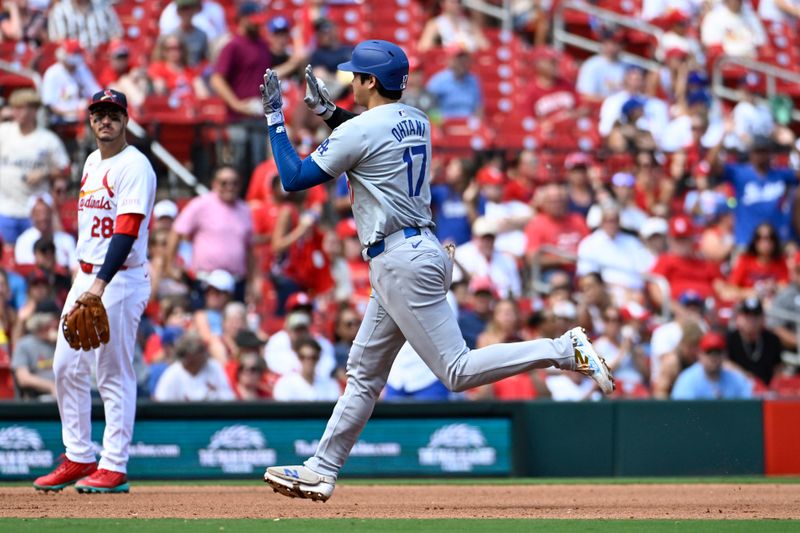 Aug 18, 2024; St. Louis, Missouri, USA; Los Angeles Dodgers designated hitter Shohei Ohtani (17) rounds the bases after hitting a solo home run against the St. Louis Cardinals in the fifth inning at Busch Stadium. Mandatory Credit: Joe Puetz-USA TODAY Sports