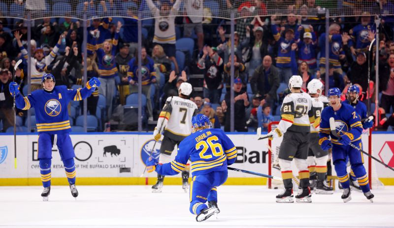 Mar 15, 2025; Buffalo, New York, USA;  Buffalo Sabres defenseman Rasmus Dahlin (26) reacts after scoring a goal to tie the game during the third period against the Vegas Golden Knights at KeyBank Center. Mandatory Credit: Timothy T. Ludwig-Imagn Images
