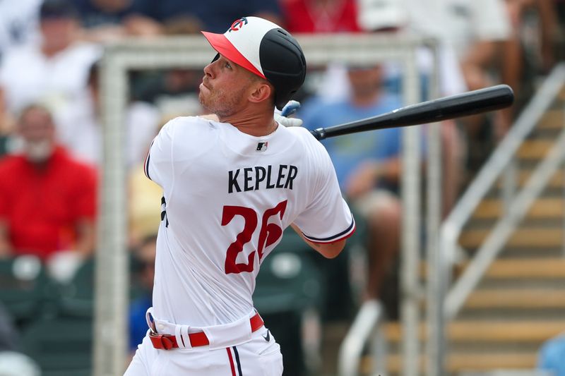 Mar 13, 2023; Fort Myers, Florida, USA;  Minnesota Twins right fielder Max Kepler (26) hits a solo home run against the New York Yankees in the fourth inning during spring training at Hammond Stadium. Mandatory Credit: Nathan Ray Seebeck-USA TODAY Sports