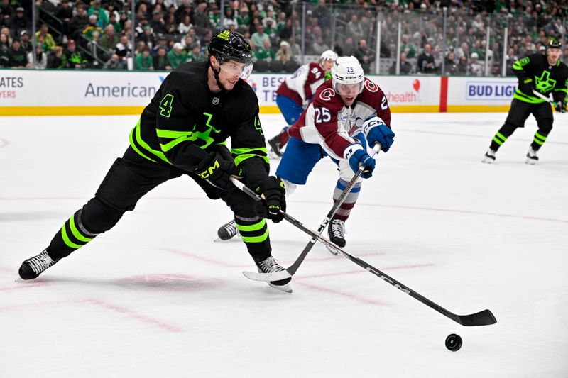 Nov 29, 2024; Dallas, Texas, USA; Dallas Stars defenseman Miro Heiskanen (4) and Colorado Avalanche right wing Logan O'Connor (25) chase the puck during the first period at the American Airlines Center. Mandatory Credit: Jerome Miron-Imagn Images