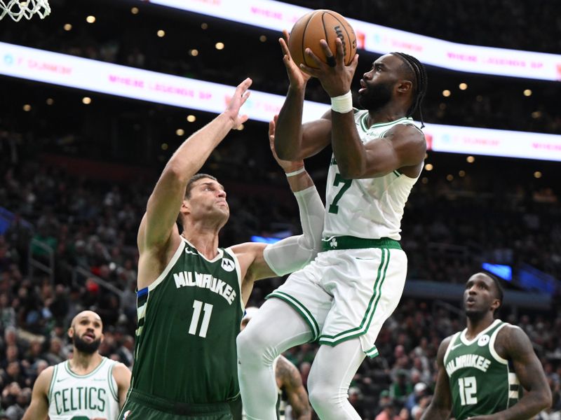 BOSTON, MASSACHUSETTS - OCTOBER 28: Jaylen Brown #7 of the Boston Celtics attempts a basket against Brook Lopez #11 of the Milwaukee Bucks during the second half at the TD Garden on October 28, 2024 in Boston, Massachusetts. NOTE TO USER: User expressly acknowledges and agrees that, by downloading and or using this photograph, User is consenting to the terms and conditions of the Getty Images License Agreement. (Photo by Brian Fluharty/Getty Images)