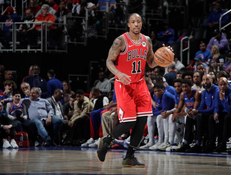 DETROIT, MI - APRIL 11: DeMar DeRozan #11 of the Chicago Bulls dribbles the ball during the game against the Detroit Pistons on April 11, 2024 at Little Caesars Arena in Detroit, Michigan. NOTE TO USER: User expressly acknowledges and agrees that, by downloading and/or using this photograph, User is consenting to the terms and conditions of the Getty Images License Agreement. Mandatory Copyright Notice: Copyright 2024 NBAE (Photo by Brian Sevald/NBAE via Getty Images)