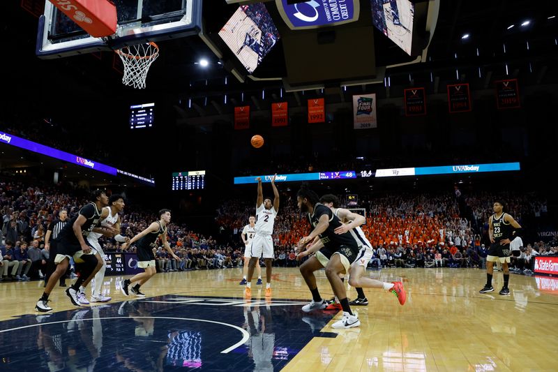 Feb 17, 2024; Charlottesville, Virginia, USA; Virginia Cavaliers guard Reece Beekman (2) attempts a free throw against the Wake Forest Demon Deacons in the final seconds in the second half at John Paul Jones Arena. Mandatory Credit: Geoff Burke-USA TODAY Sports