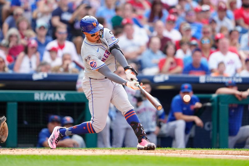 Sep 14, 2024; Philadelphia, Pennsylvania, USA; New York Mets third baseman Mark Vientos (27) hits a double against the Philadelphia Phillies during the third inning at Citizens Bank Park. Mandatory Credit: Gregory Fisher-Imagn Images