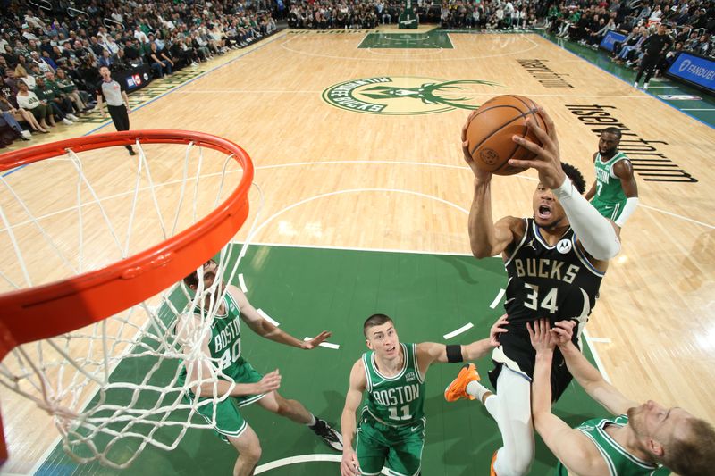 MILWAUKEE, WI - APRIL 9: Giannis Antetokounmpo #34 of the Milwaukee Bucks drives to the basket during the game against the Boston Celtics on April 9, 2024 at the Fiserv Forum Center in Milwaukee, Wisconsin. NOTE TO USER: User expressly acknowledges and agrees that, by downloading and or using this Photograph, user is consenting to the terms and conditions of the Getty Images License Agreement. Mandatory Copyright Notice: Copyright 2024 NBAE (Photo by Gary Dineen/NBAE via Getty Images).