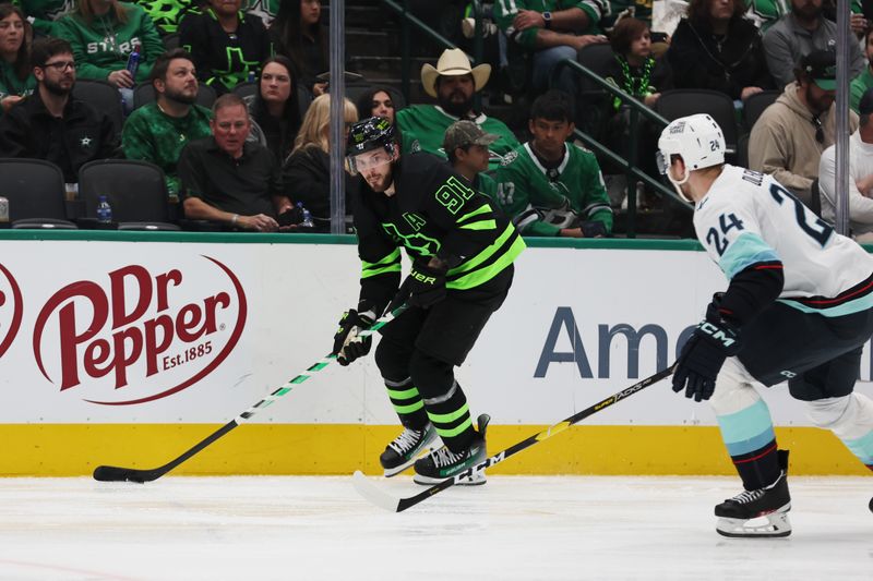 Apr 13, 2024; Dallas, Texas, USA; Dallas Stars center Tyler Seguin (91) skates up ice with the puck against the Seattle Kraken at American Airlines Center. Mandatory Credit: Tim Heitman-USA TODAY Sports