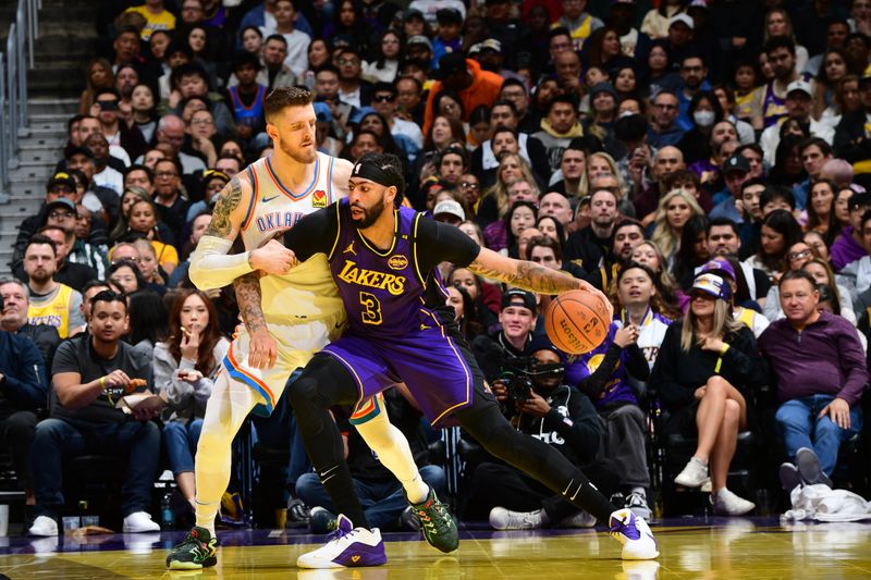 LOS ANGELES, CA - NOVEMBER 29: Anthony Davis #3 of the Los Angeles Lakers dribbles the ball during the game against the Oklahoma City Thunder during a Emirates NBA Cup game on October 22, 2024 at Crypto.Com Arena in Los Angeles, California. NOTE TO USER: User expressly acknowledges and agrees that, by downloading and/or using this Photograph, user is consenting to the terms and conditions of the Getty Images License Agreement. Mandatory Copyright Notice: Copyright 2024 NBAE (Photo by Adam Pantozzi/NBAE via Getty Images)