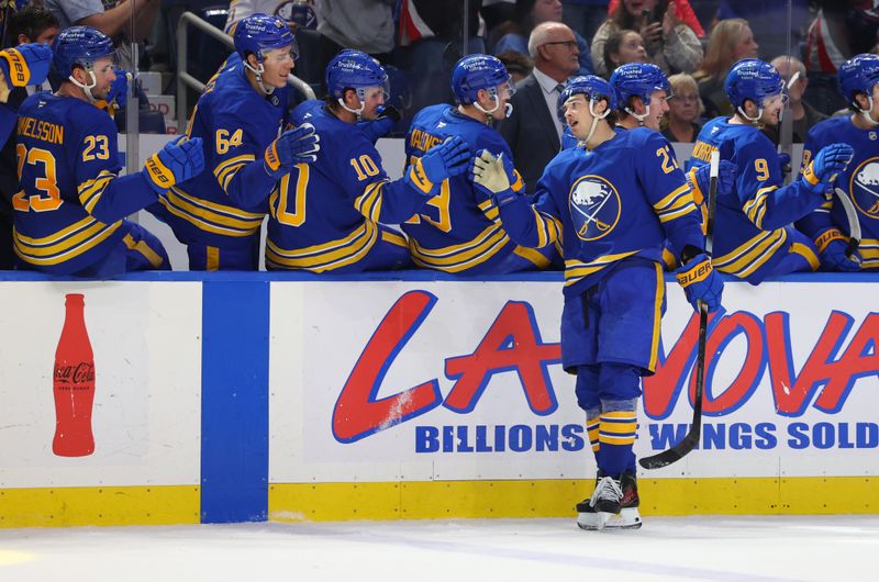Mar 10, 2026; Buffalo, New York, USA;  Buffalo Sabres right wing Jack Quinn (22) celebrates his third goal of the game with teammates during the third period against the San Jose Sharks at KeyBank Center. Mandatory Credit: Timothy T. Ludwig-Imagn Images