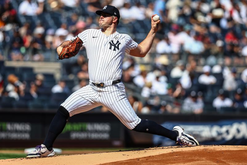 Sep 15, 2024; Bronx, New York, USA;  New York Yankees starting pitcher Carlos Rodon (55) pitches in the first inning against the Boston Red Sox at Yankee Stadium. Mandatory Credit: Wendell Cruz-Imagn Images