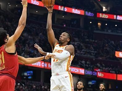 CLEVELAND, OHIO - NOVEMBER 28: Onyeka Okongwu #17 of the Atlanta Hawks shoots over Jarrett Allen #31 of the Cleveland Cavaliers during the first half of an NBA In-Season Tournament game at Rocket Mortgage Fieldhouse on November 28, 2023 in Cleveland, Ohio. NOTE TO USER: User expressly acknowledges and agrees that, by downloading and or using this photograph, User is consenting to the terms and conditions of the Getty Images License Agreement. (Photo by Jason Miller/Getty Images)