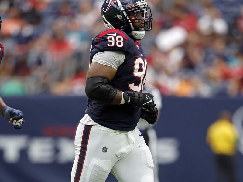 Houston Texans defensive tackle Sheldon Rankins (98) in action during an NFL preseason football game against the Miami Dolphins, Saturday, Aug. 19, 2023, in Houston. (AP Photo/Tyler Kaufman)