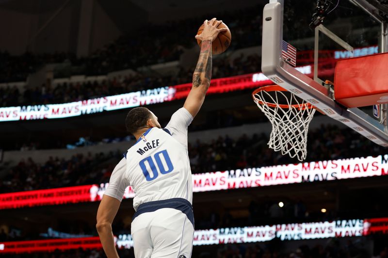 DALLAS, TEXAS - APRIL 07: JaVale McGee #00 of the Dallas Mavericks dunks the ball in the first half against the Chicago Bulls at American Airlines Center on April 07, 2023 in Dallas, Texas. NOTE TO USER: User expressly acknowledges and agrees that, by downloading and or using this photograph, User is consenting to the terms and conditions of the Getty Images License Agreement. (Photo by Tim Heitman/Getty Images)