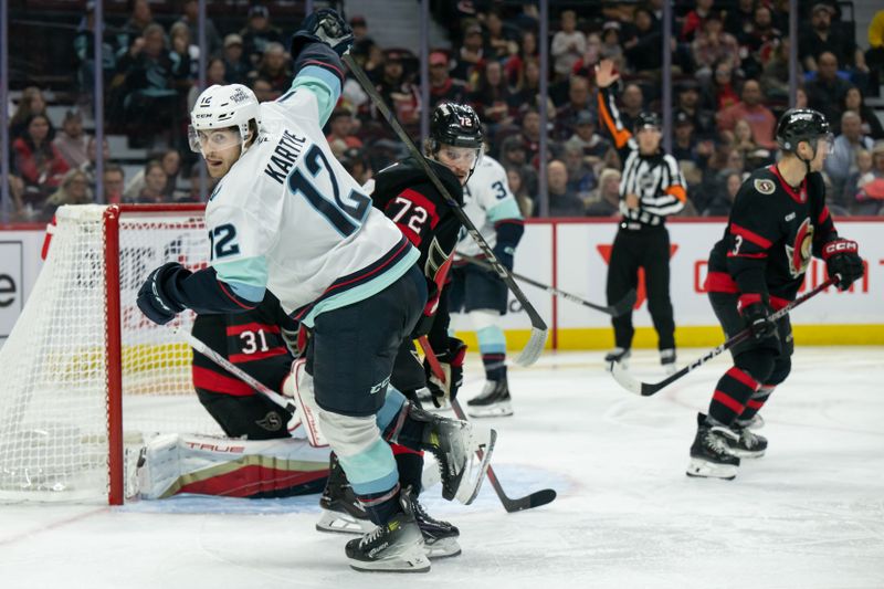 Nov 2, 2024; Ottawa, Ontario, CAN; Seattle Kraken left wing Tye Kartye (12) chases the puck in the second period against the  Ottawa Senators at the Canadian Tire Centre. Mandatory Credit: Marc DesRosiers-Imagn Images