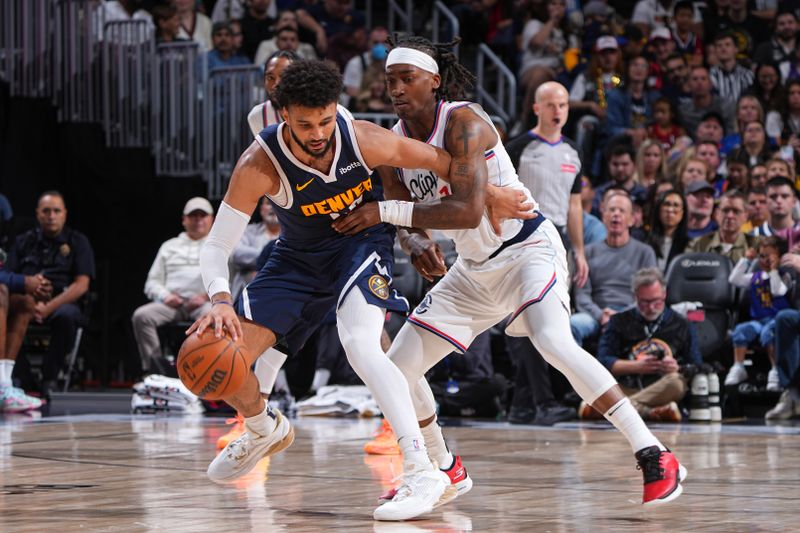 DENVER, CO - OCTOBER 26: Terance Mann #14 of the LA Clippers plays defense during the game against the Denver Nuggets on October 26, 2024 at the Ball Arena in Denver, Colorado. NOTE TO USER: User expressly acknowledges and agrees that, by downloading and/or using this Photograph, user is consenting to the terms and conditions of the Getty Images License Agreement. Mandatory Copyright Notice: Copyright 2024 NBAE (Photo by Garrett Ellwood/NBAE via Getty Images)