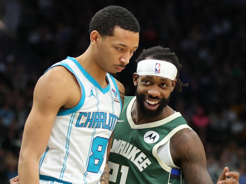 MILWAUKEE, WISCONSIN - FEBRUARY 09: Nick Smith Jr. #8 of the Charlotte Hornets works against Patrick Beverley #22 of the Milwaukee Bucks during a game at Fiserv Forum on February 09, 2024 in Milwaukee, Wisconsin. NOTE TO USER: User expressly acknowledges and agrees that, by downloading and or using this photograph, User is consenting to the terms and conditions of the Getty Images License Agreement. (Photo by Stacy Revere/Getty Images)