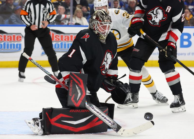 Dec 27, 2025; Buffalo, New York, USA;  Buffalo Sabres goaltender Ukko-Pekka Luukkonen (1) makes a save during the first period against the Boston Bruins at KeyBank Center. Mandatory Credit: Timothy T. Ludwig-Imagn Images