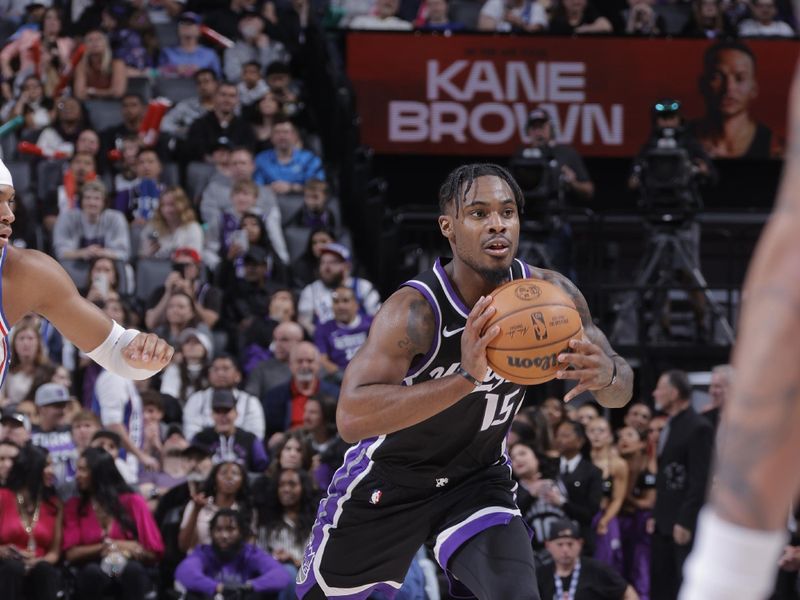 SACRAMENTO, CA - MARCH 25:  Davion Mitchell #15 of the Sacramento Kings passes the ball during the game on March 25, 2024 at Golden 1 Center in Sacramento, California. NOTE TO USER: User expressly acknowledges and agrees that, by downloading and or using this Photograph, user is consenting to the terms and conditions of the Getty Images License Agreement. Mandatory Copyright Notice: Copyright 2024 NBAE (Photo by Rocky Widner/NBAE via Getty Images)