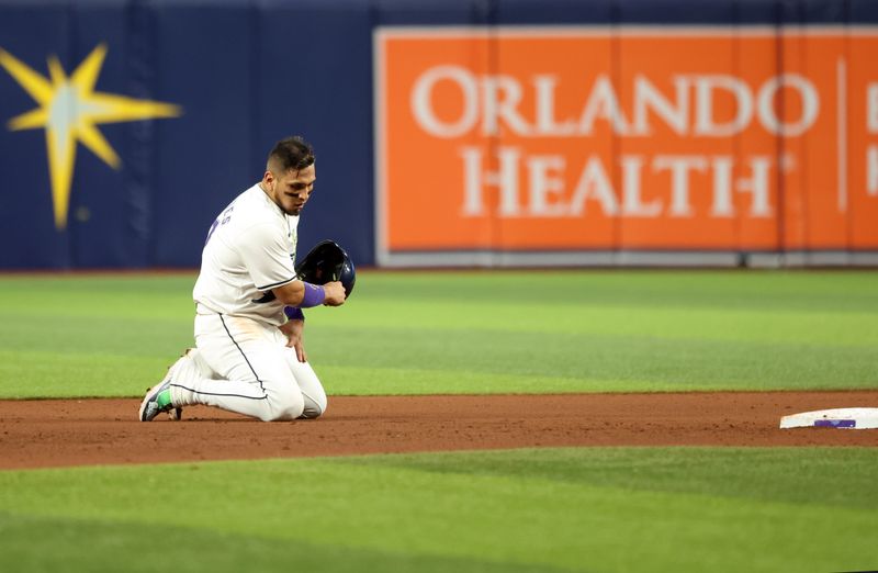 May 10, 2024; St. Petersburg, Florida, USA;  Tampa Bay Rays third base Isaac Paredes (17) reacts after he is tagged out after stealing against the New York Yankees during the seventh inning at Tropicana Field. Mandatory Credit: Kim Klement Neitzel-USA TODAY Sports