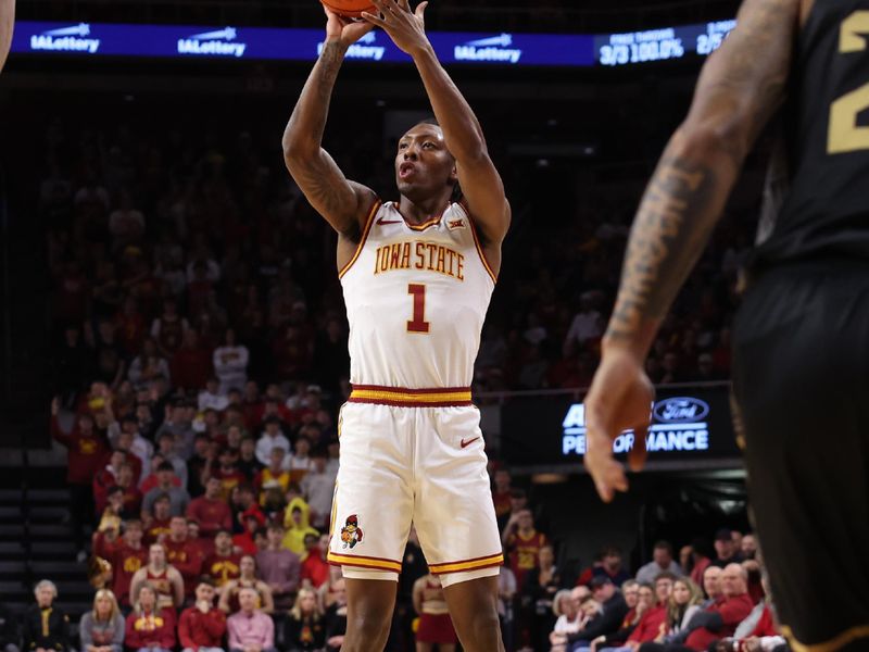 Jan 20, 2026; Ames, Iowa, USA; Iowa State Cyclones guard Jamarion Batemon (1) shoots in their game against the UCF Knight during the first half at James H. Hilton Coliseum. Mandatory Credit: Reese Strickland-Imagn Images