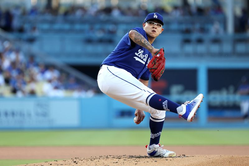 Aug 3, 2023; Los Angeles, California, USA;  Los Angeles Dodgers starting pitcher Julio Urias (7) pitches during the first inning against the Oakland Athletics at Dodger Stadium. Mandatory Credit: Kiyoshi Mio-USA TODAY Sports