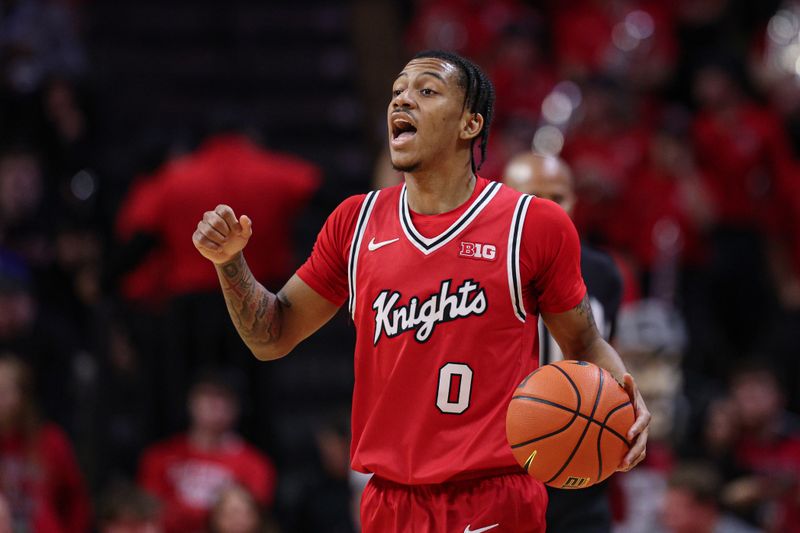 Feb 15, 2026; Piscataway, New Jersey, USA; Rutgers Scarlet Knights guard Tariq Francis (0) dribbles up court against the Maryland Terrapins during the second half at Jersey Mike's Arena. Mandatory Credit: Vincent Carchietta-Imagn Images