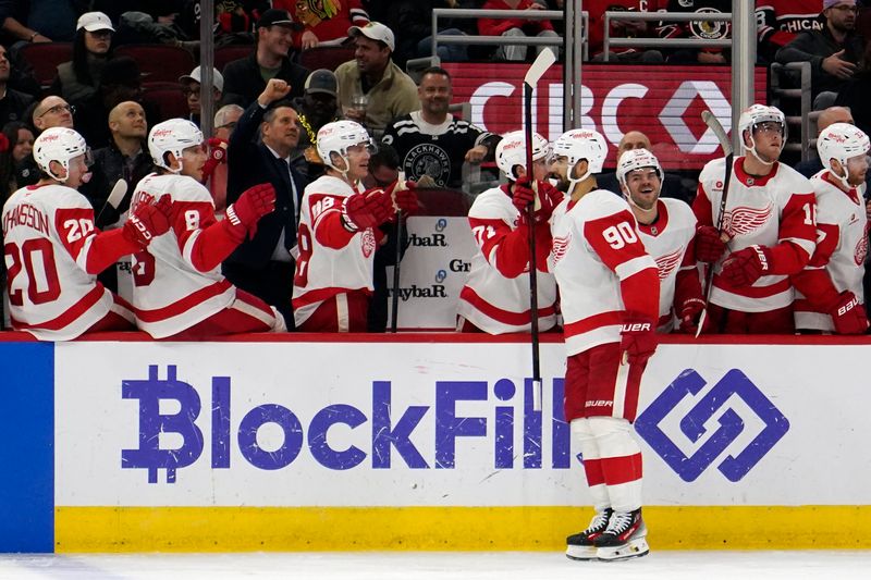 Nov 6, 2024; Chicago, Illinois, USA; Detroit Red Wings center Joe Veleno (90) celebrates his goal against the Chicago Blackhawks during the third period at United Center. Mandatory Credit: David Banks-Imagn Images