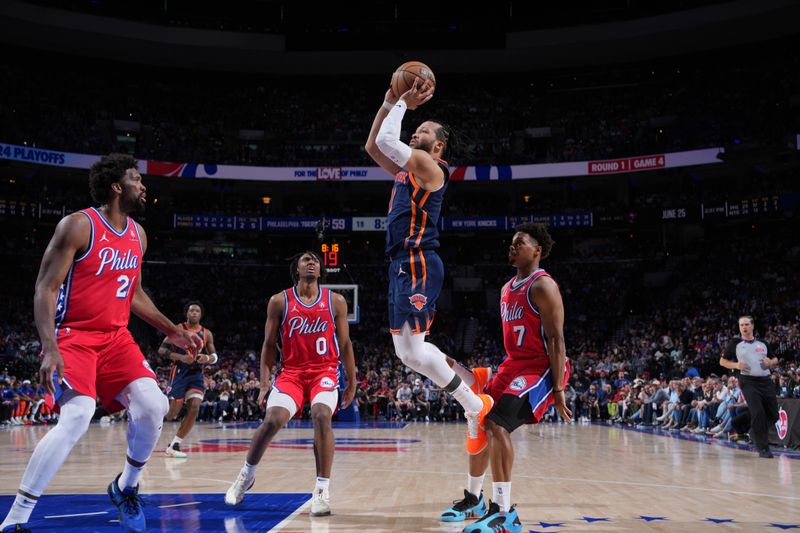 PHILADELPHIA, PA - APRIL 28: Jalen Brunson #11 of the New York Knicks shoots the ball during the game against the Philadelphia 76ers during Round 1 Game 4 of the 2024 NBA Playoffs on April 28, 2024 at the Wells Fargo Center in Philadelphia, Pennsylvania NOTE TO USER: User expressly acknowledges and agrees that, by downloading and/or using this Photograph, user is consenting to the terms and conditions of the Getty Images License Agreement. Mandatory Copyright Notice: Copyright 2024 NBAE (Photo by Jesse D. Garrabrant/NBAE via Getty Images)