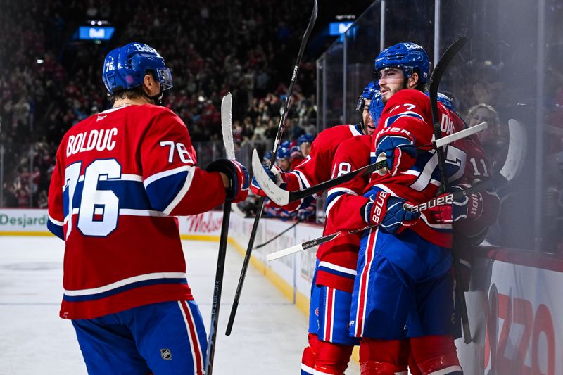 Nov 4, 2025; Montreal, Quebec, CAN; Montreal Canadiens center Kirby Dach (77) celebrates his second goal of the game against the Philadelphia Flyers with his teammates during the second period at Bell Centre. Mandatory Credit: David Kirouac-Imagn Images