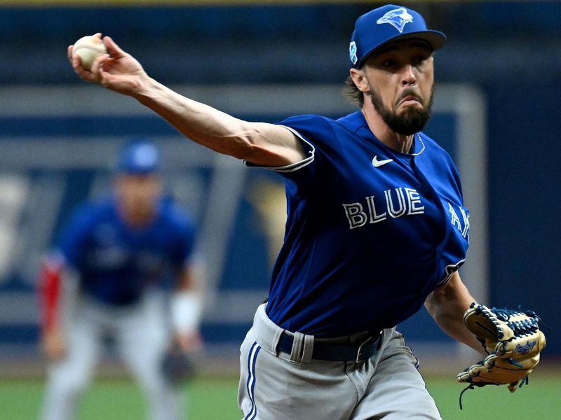 Mar 9, 2023; St. Petersburg, Florida, USA; Toronto Blue Jays pitcher Casey Lawrence (62) throws a pitch in the first inning of a spring training game against the Tampa Bay Rays  at Tropicana Field. Mandatory Credit: Jonathan Dyer-USA TODAY Sports