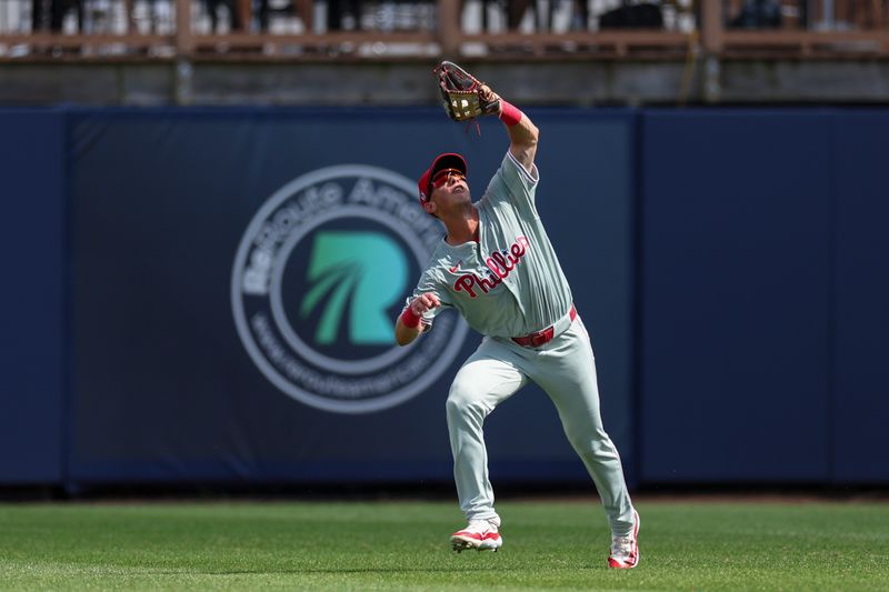 Mar 7, 2024; Port Charlotte, Florida, USA;  Philadelphia Phillies right fielder Matt Kroon (70) catches a fly ball against the Tampa Bay Rays in the fourth inning at Charlotte Sports Park. Mandatory Credit: Nathan Ray Seebeck-USA TODAY Sports