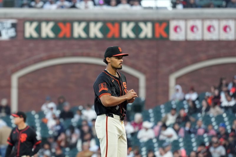 Apr 27, 2024; San Francisco, California, USA; San Francisco Giants starting pitcher Jordan Hicks (12) stands on the mound during the fifth inning against the Pittsburgh Pirates at Oracle Park. Mandatory Credit: Darren Yamashita-USA TODAY Sports